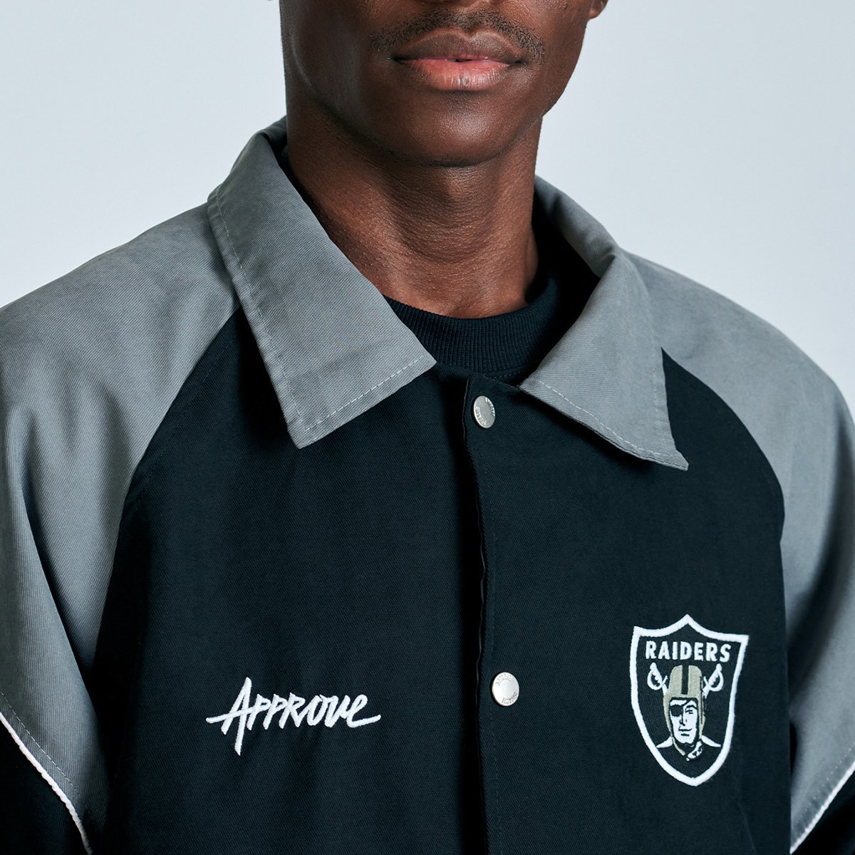 Miniatura Jaqueta College Approve X NFL Raiders Preto - P